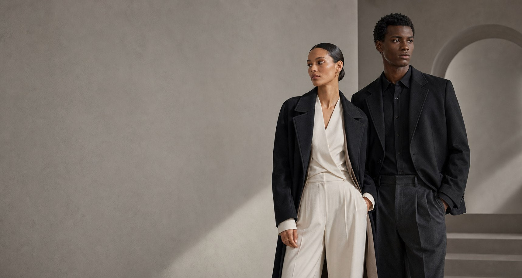 GYUMA COLLECTIONS editorial campaign with two adult models in monochrome tailoring